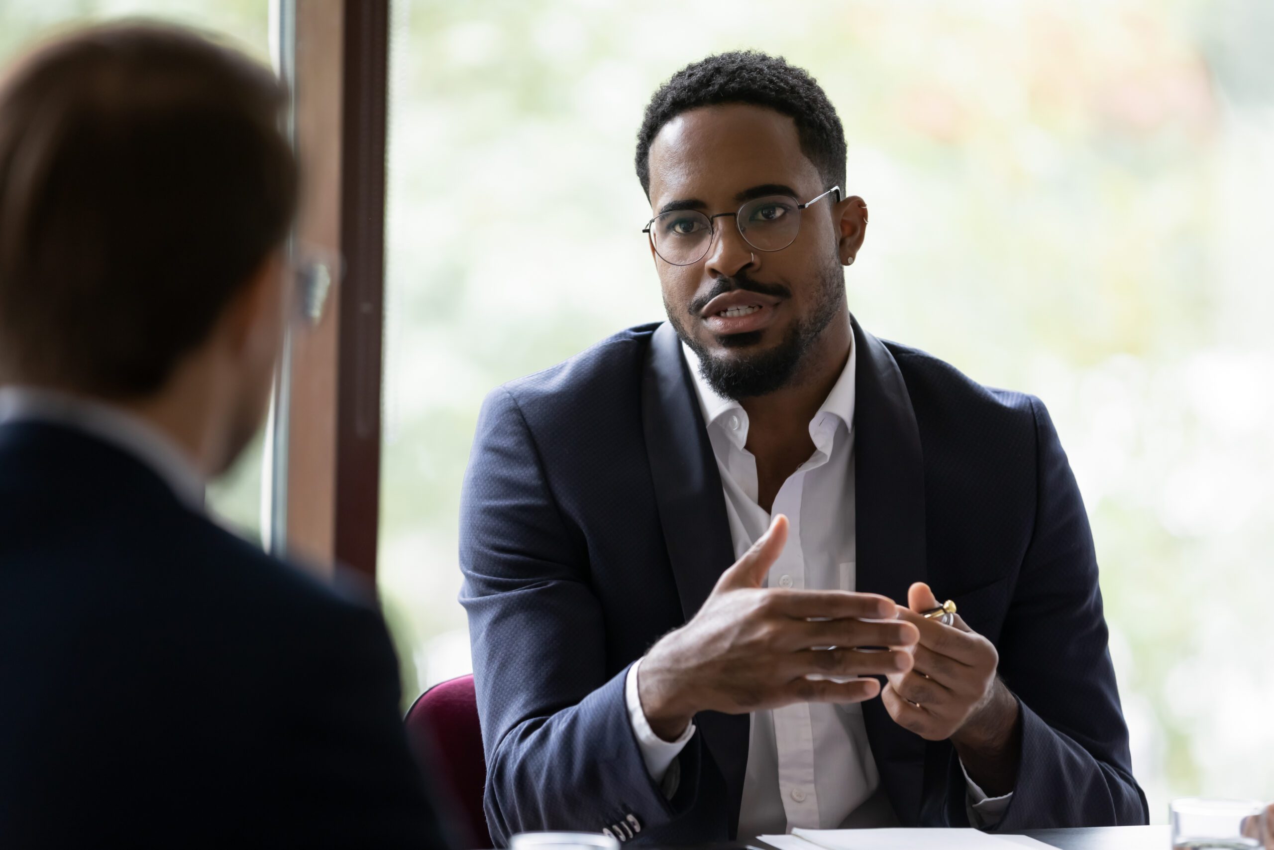 Business Consultant Explaining Concept To Client